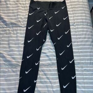 Nike Black and Silver Swoosh Leggings